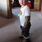 Kid in ski boots
