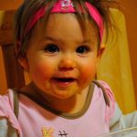 Messy faced Tegan preps for cookie bars and ice cream. Clik for more.