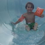 Tory slides alone. Well, him and his water wings. Tory slides alone. Well, him and his water wings.