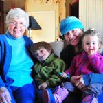 Grandma Landgren gets an armload of visitors. Willmar, Minnesota.