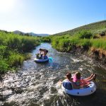 Kari, Tory, Tegan, Michelle, and Sophia tube the creek