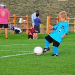 Christian kicks it.