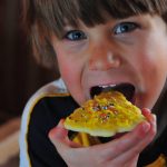 Tory eats his favorite one.