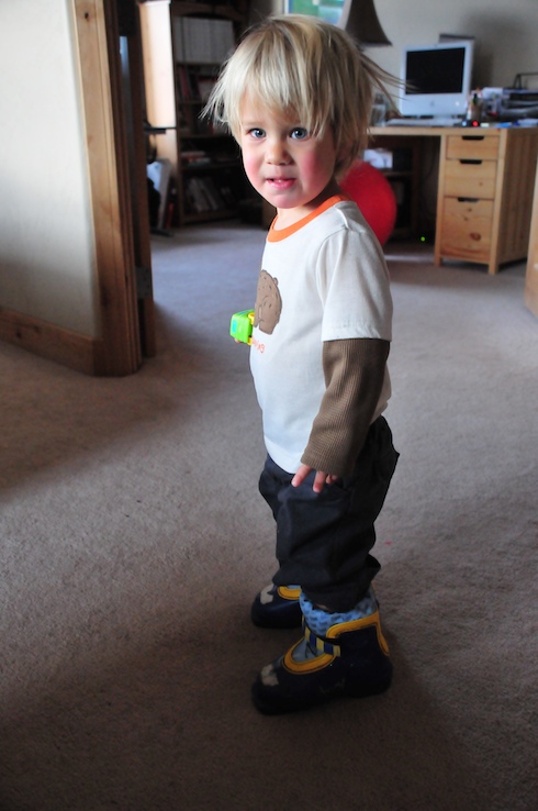Kid in ski boots